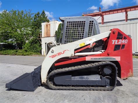 takeuchi skid steer tracks tl240|tl240 lift capacity.